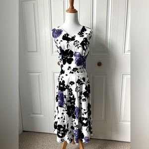 Retro style dress. White with purple and black flowers.